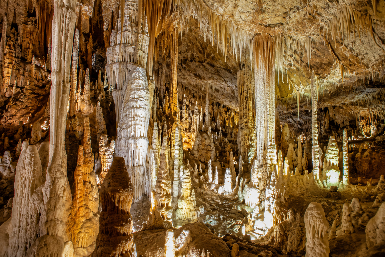 Stalactites and stalagmites in a limestone cavern